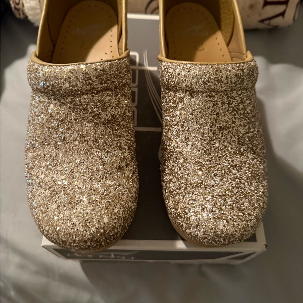 Dansko Glittering Gold Mules